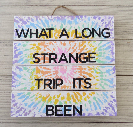 strange trip wooden sign