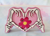 Skeleton heart hands decor