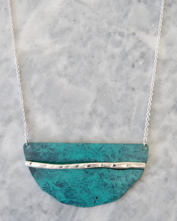 patina half disc necklace