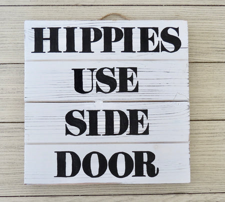 hippies use side door sign