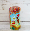 Groovy woodstock candle