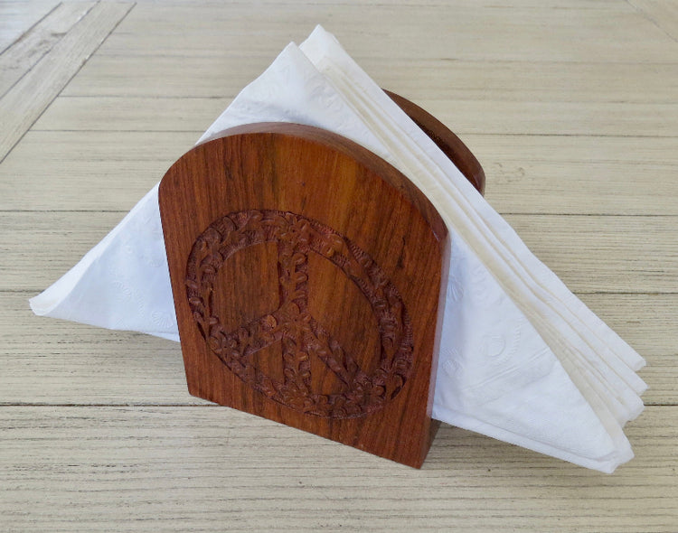 Carved peace sign napkin holder