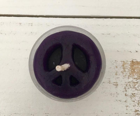 Dark purple peace sign candle