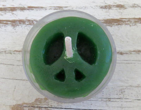 Dark green peace sign candle