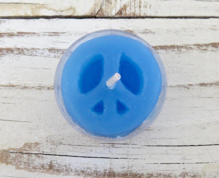 Light blue peace sign candle