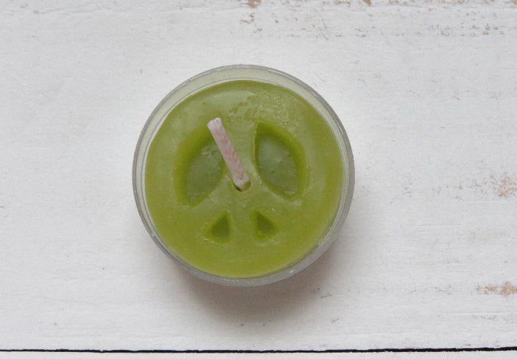 Light green peace sign candle