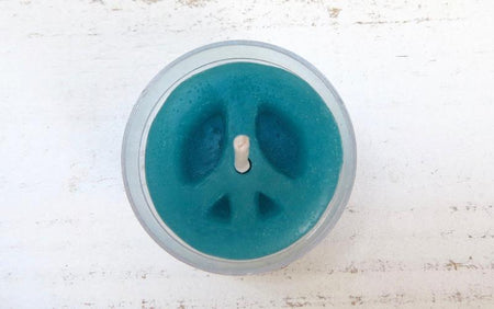 Turquoise peace sign candle